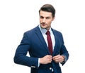 Confident businessman putting on suit jacket Royalty Free Stock Photo