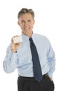 Confident Businessman Showing Blank Business Card Royalty Free Stock Photo