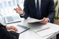 Confident businessman sitting in front of office manager talk conducting to interviewer with colleague or boss for business Royalty Free Stock Photo