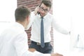 Confident businessman solves work problems