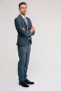 Confident businessman standing with arms folded Royalty Free Stock Photo