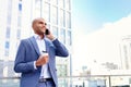 Confident businessman standing near office Royalty Free Stock Photo