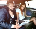 Confident businessman talking on the phone in car Royalty Free Stock Photo