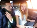 Confident businessman talking on the phone in car Royalty Free Stock Photo