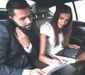 Confident businessman talking on the phone in car Royalty Free Stock Photo