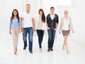 Confident businesspeople walking together Royalty Free Stock Photo