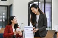 Businesswoman discussing results or presenting new project to her colleague. Royalty Free Stock Photo