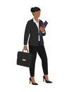 Confident businesswoman holding a briefcase and paperwork Royalty Free Stock Photo