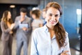 Confident businesswoman looking at camera in office Royalty Free Stock Photo