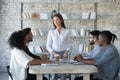 Confident businesswoman team leader speaking at corporate meeting Royalty Free Stock Photo