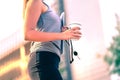 Confident businesswoman walking to work in city. Office worker, student, realtor or lawyer with coffee cup. Career woman. Royalty Free Stock Photo