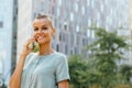 Confident Businesswoman with Short Hair Answering Phone Call Royalty Free Stock Photo