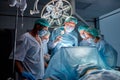 Confident caucasian doctors and assistants take childbirth