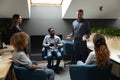 Confident male manager explain project strategy at corporate group meeting Royalty Free Stock Photo