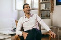 Confident and cheerful Syrian man is listening to a conversation Royalty Free Stock Photo