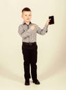 Confident child has business start up. Modern life. small boy with mobile phone. little boss. Ceo direstor. Office life Royalty Free Stock Photo