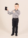 Confident child has business start up. Modern life. small boy with mobile phone. little boss. Ceo direstor. Office life Royalty Free Stock Photo