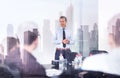 Confident company leader on business meeting against new york city manhattan buildings and skyscrapers window reflection Royalty Free Stock Photo