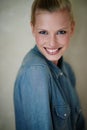 Confident and content. A beautiful young woman in casualwear - studio shot. Royalty Free Stock Photo