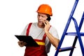 Confident contractor talking on mobile phone. Royalty Free Stock Photo