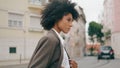 Businesswoman walking city street hurry on meeting close up. Woman crossing road Royalty Free Stock Photo