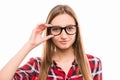 Confident cute young woman with glasses