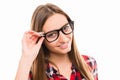 Confident cute young woman with glasses