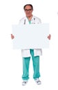 Confident doctor showing blank whiteboard Royalty Free Stock Photo