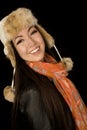 Confident ethnic teen wearing winter scarf and hat Royalty Free Stock Photo