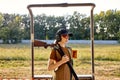 confident european woman with rifle weapon in outdoor academy shooting range Royalty Free Stock Photo