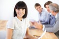 Confident and exceptional at her job. Portrait of a pretty young executive at a strategy meeting with her business team. Royalty Free Stock Photo