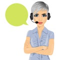 Confident female customer support phone operator with arms folded and speech bubble Royalty Free Stock Photo