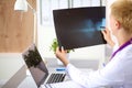 Confident female doctor examining accurately a rib Royalty Free Stock Photo