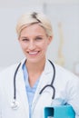 Confident female doctor smiling in clinc Royalty Free Stock Photo