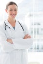 Confident female doctor standing arms crossed Royalty Free Stock Photo