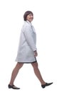 confident female paramedic striding forward. isolated on a white background. Royalty Free Stock Photo