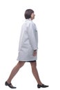 confident female paramedic striding forward. isolated on a white background. Royalty Free Stock Photo