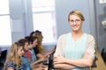 Confident female teacher in computer class Royalty Free Stock Photo