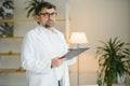 Confident general practitioner is ready to work. Royalty Free Stock Photo