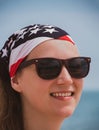 Confident girl in sunglasses american flag bandana. USA Independence Day patriotism concept, Memorial Day national pride