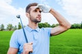 Confident golfer. Royalty Free Stock Photo