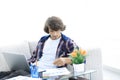 Confident guy working with laptop at home. Royalty Free Stock Photo