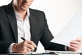 Confident happy businessman signing contract Royalty Free Stock Photo