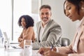 Confident happy senior old business man leader sitting at office meeting table. Royalty Free Stock Photo