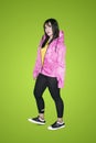 Confident hip hop dancer standing on studio Royalty Free Stock Photo