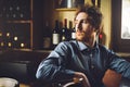 Confident hipster guy at the bar Royalty Free Stock Photo