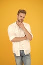 Confident in his choice. Handsome man wear white tshirt and posing in studio. Casually handsome. Casual urban lifestyle Royalty Free Stock Photo