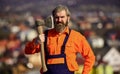 Confident in his work. build and construction. Skilled architect repair and fix. engineer career. bearded man in uniform