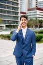 Confident Hispanic businessman in suit