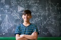 Confident Latino Boy Smiling At Camera During Math Lesson Royalty Free Stock Photo